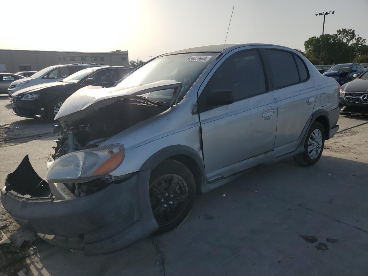 TOYOTA ECHO 2000. Lot# 69519344. VIN JTDBT1234Y0036380. Photo 1